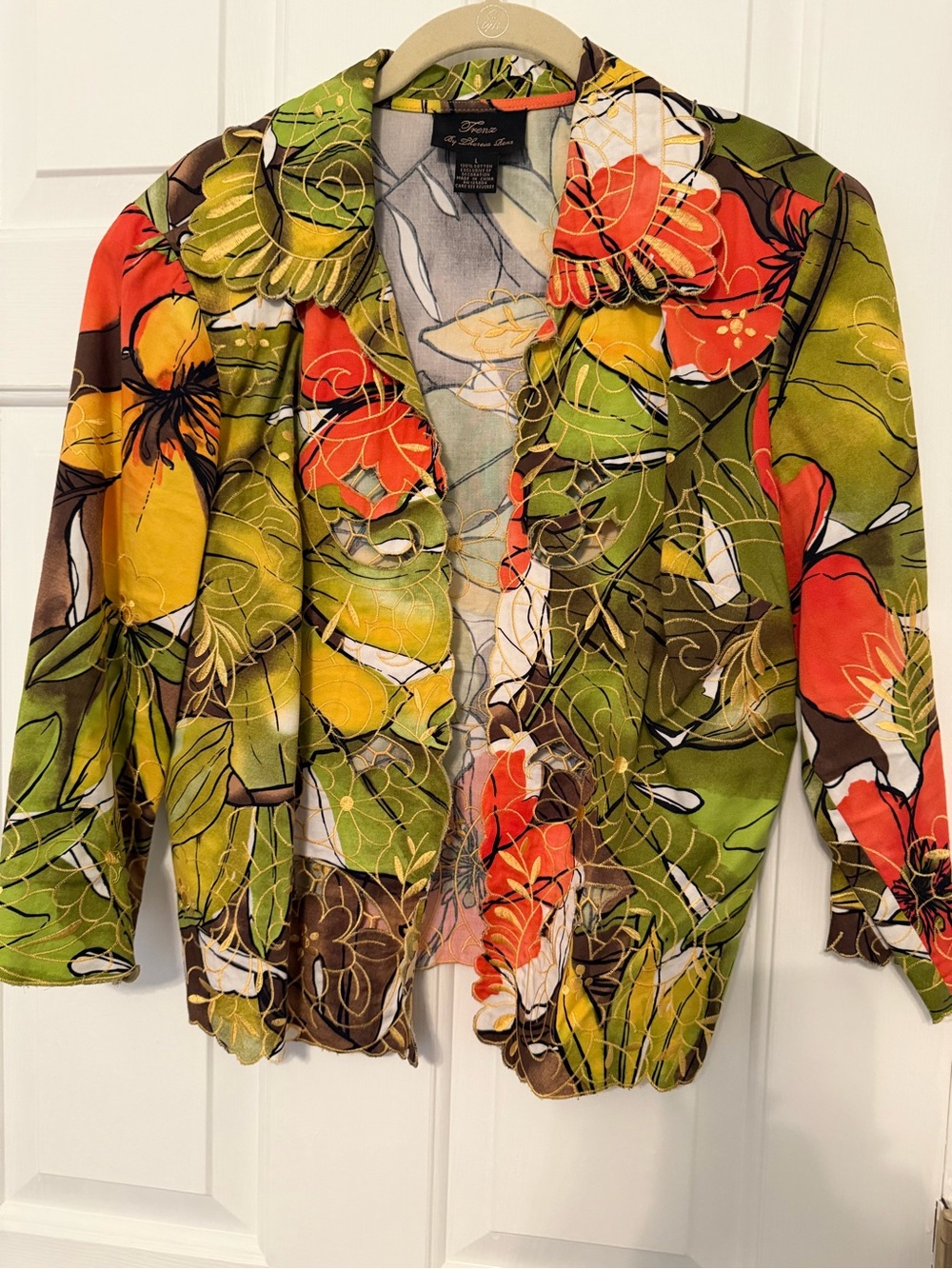 Misses-cut out design & bold print jacket. Lg. $20